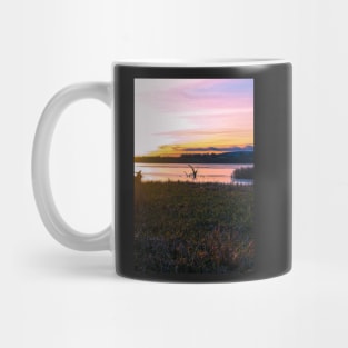 Frozen Scottish lake at sunset on a winter afternoon - portrait Mug